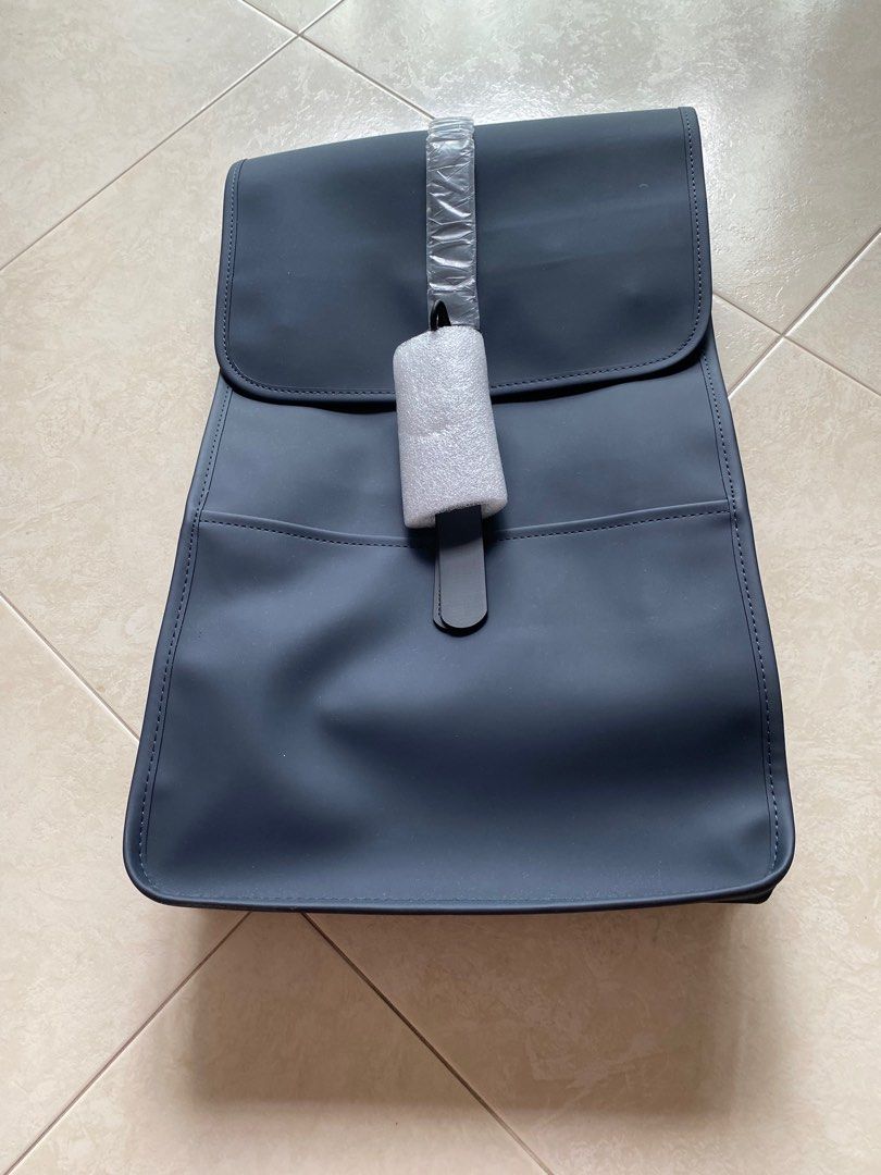 Rains blue backpack shop