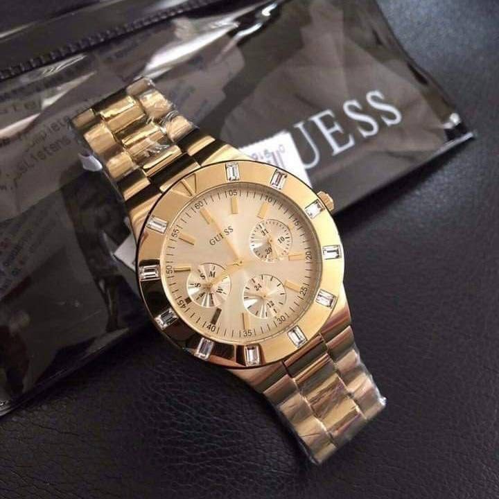 RESTOCK ORIGINAL GUESS GLISTEN GOLD DIAL GOLD STEEL LADIES