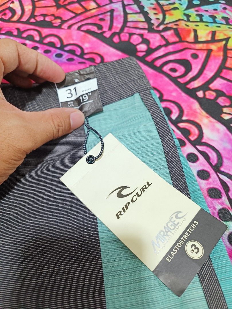 RIPCURL BOARDSHORT MIRAGE (Category: Shorts) located in Bacoor. Submitted by secretsup (Listing ID 1258688669, Image 3). Description: AUTHENTIC RIPCURL BOARD SHORT WITH ISSUE SMALL SMALL HOLE LENGTH - 19 WIDTH - 31.