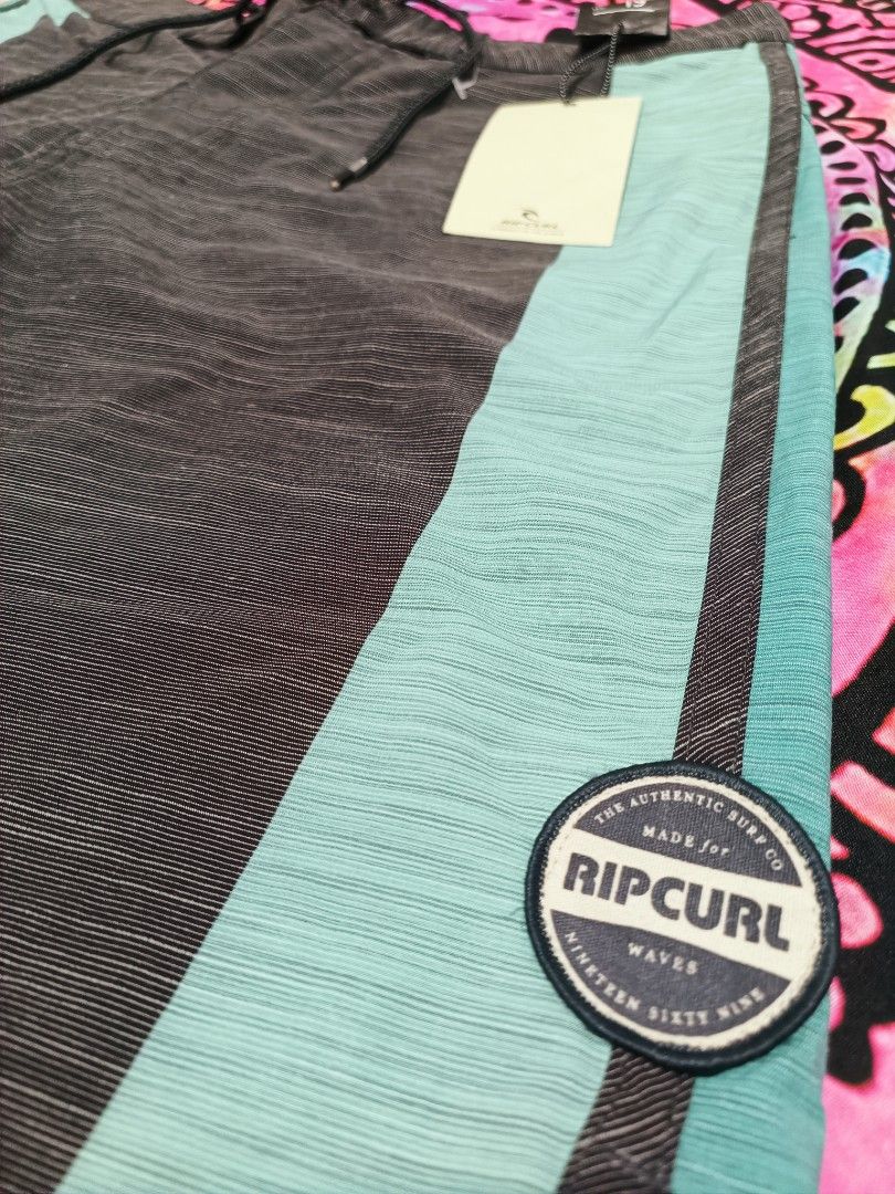 RIPCURL BOARDSHORT MIRAGE (Category: Shorts) located in Bacoor. Submitted by secretsup (Listing ID 1258688669, Image 2). Description: AUTHENTIC RIPCURL BOARD SHORT WITH ISSUE SMALL SMALL HOLE LENGTH - 19 WIDTH - 31.