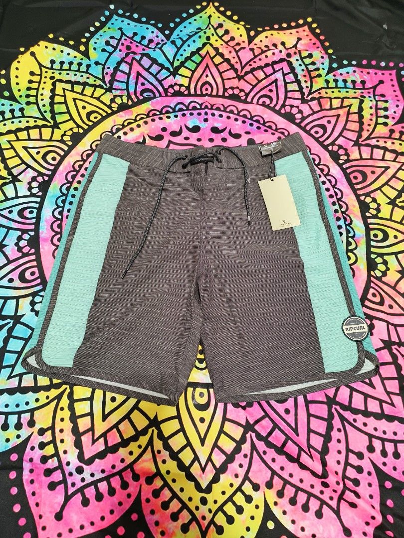 RIPCURL BOARDSHORT MIRAGE (Category: Shorts) located in Bacoor. Submitted by secretsup (Listing ID 1258688669, Image 1). Description: AUTHENTIC RIPCURL BOARD SHORT WITH ISSUE SMALL SMALL HOLE LENGTH - 19 WIDTH - 31.