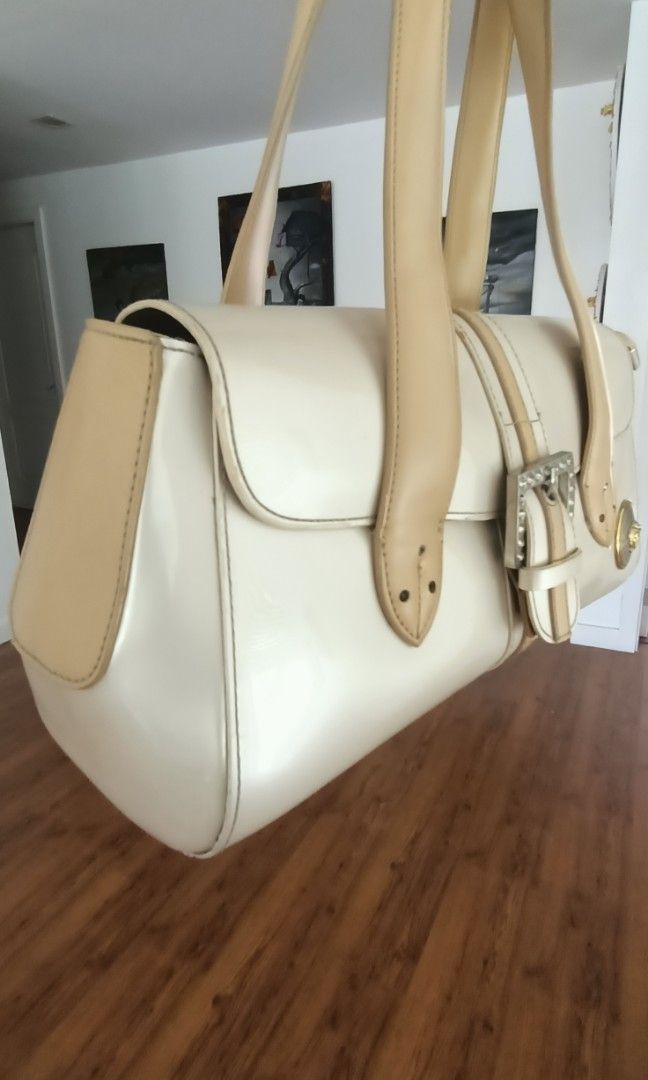 Vintage Versace Handbag/shoulder bag (Category: Luxury Bags & Wallets) located in Makati City. Submitted by camiljam.shop (Listing ID 1258638525, Image 2). Description: ♥️preloved Japan ♥️ pretty and good condition kindly message for more details 😇♥️.