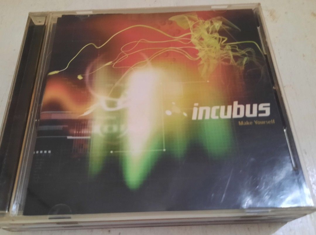 5 90s - 2000s Alternative / Rock cds + 1 Free CD (Category: CDs & DVDs) located in Pasig City. Submitted by cher_hobi (Listing ID 1258870453, Image 3). Description: Original CDs (set) Nirvana: Greatest Hits is a compilation featuring the grunge band's popular tracks, showcasing their transition from punk to mainstream success with a mix of grunge, alternative, and hard rock styles. Incubus: Make Yourself is their third studio album, featuring a m