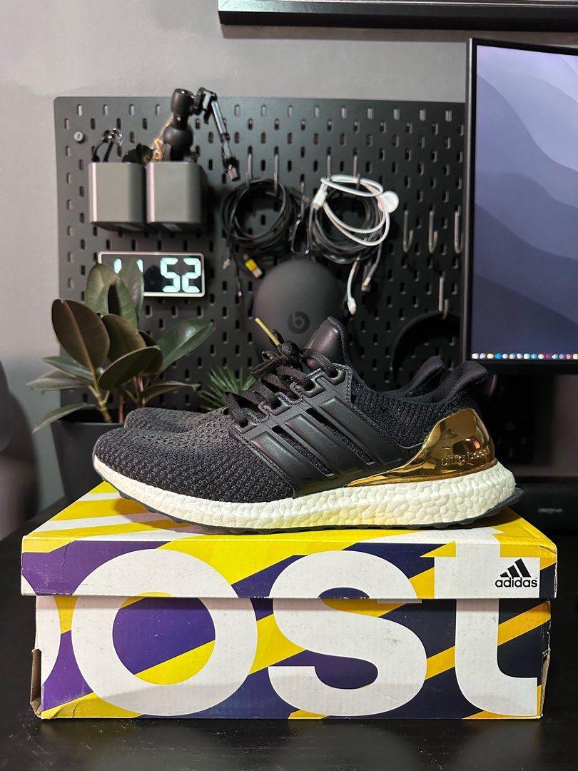 Adidas ultra boost 2025 ltd black gold