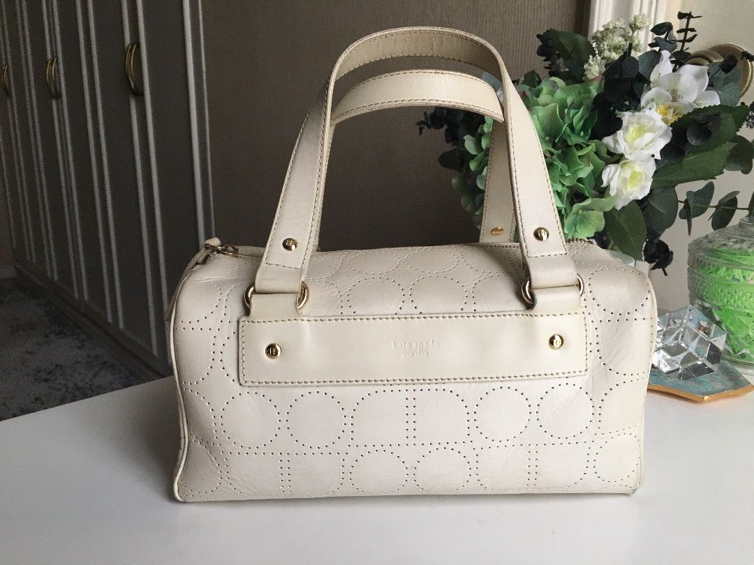 Authentic Kate Spade Noel Handbag Real Leather (Category: Luxury Bags & Wallets) located in Manila. Submitted by theocclosetmanila (Listing ID 1258723741, Image 1). Description: Circa early 2000s thus the color of the bag. This was before Kate Spade became more mainstream. If you’re able to clean the white leather, this will make for a classy, timeless bag that will last a long time. Size: 5 x 9.5 x 6 inches Original Price: $495.00 Purchased at: 