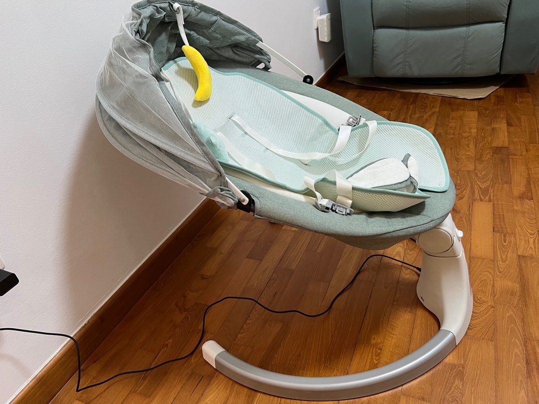 Electric outlet rocking cradle