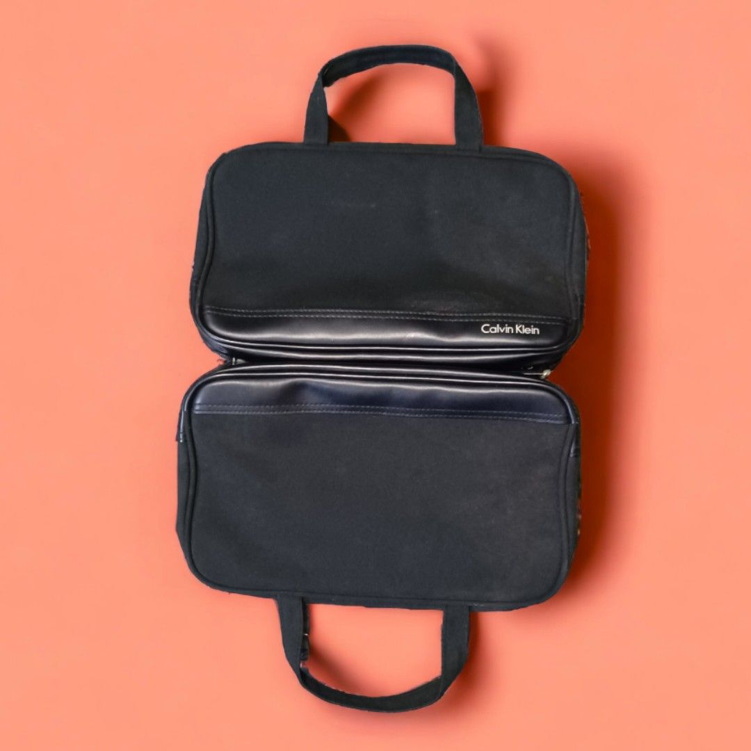 Calvin Klein Eternity Black Cosmetic Bag (Category: Purses & Pouches) located in Manila. Submitted by 21preloveds (Listing ID 1258755402, Image 1). Description: Authentic Not used but with marks due to storage Good for storage of make-up or other necessities.