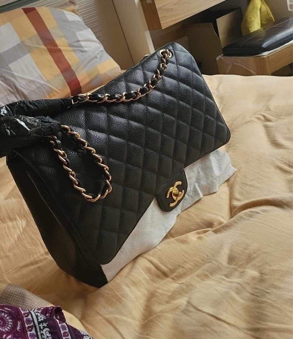 Sold at Auction: CHANEL Caviar Leather Maxi Classic Handbag W Box