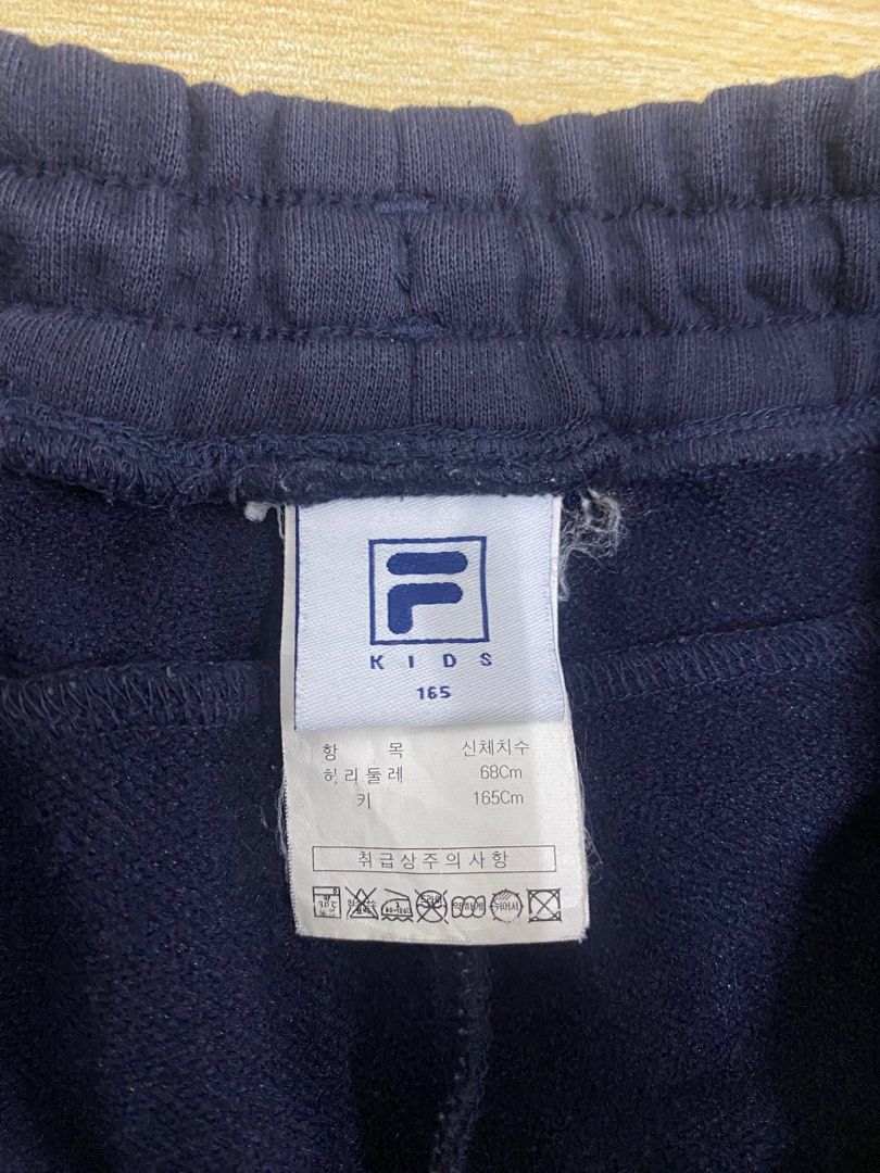 Fila side outlet tape pants