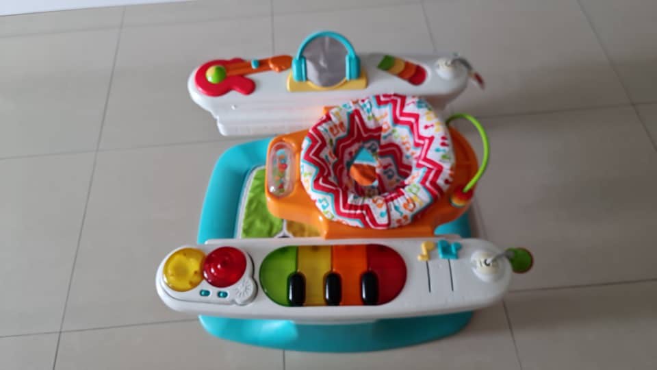 Fisher price piano shop exersaucer