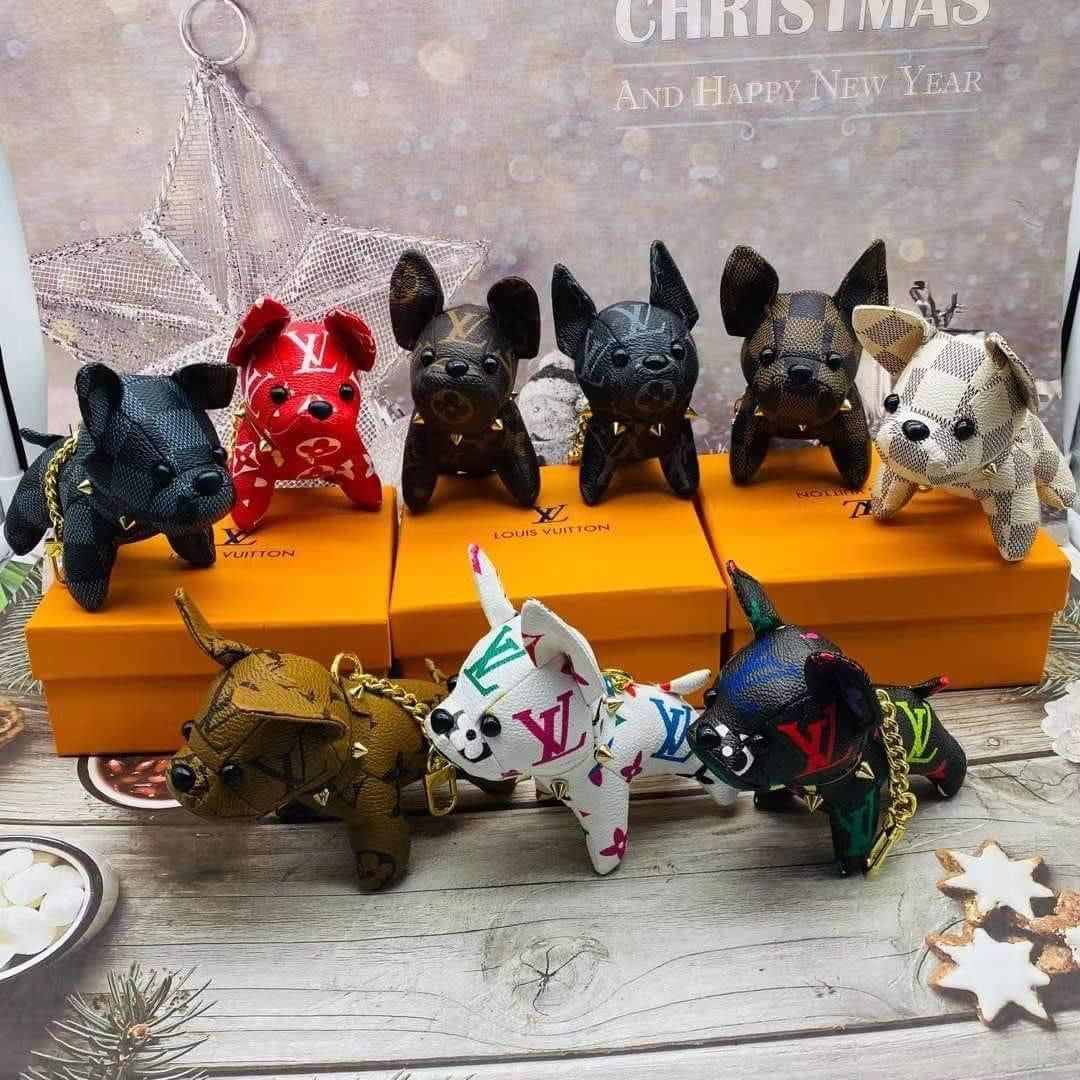 Lv dog charm, Hobbies & Toys, Toys & Games on Carousell