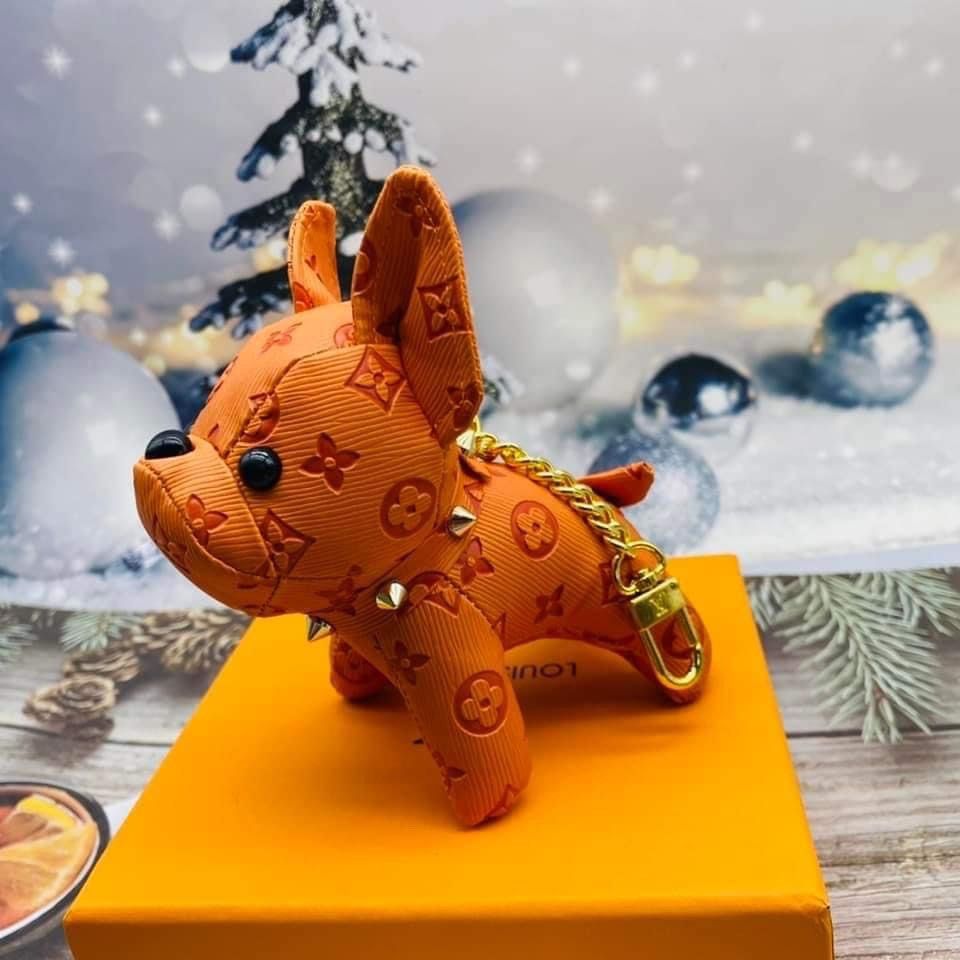 Lv dog charm, Hobbies & Toys, Toys & Games on Carousell