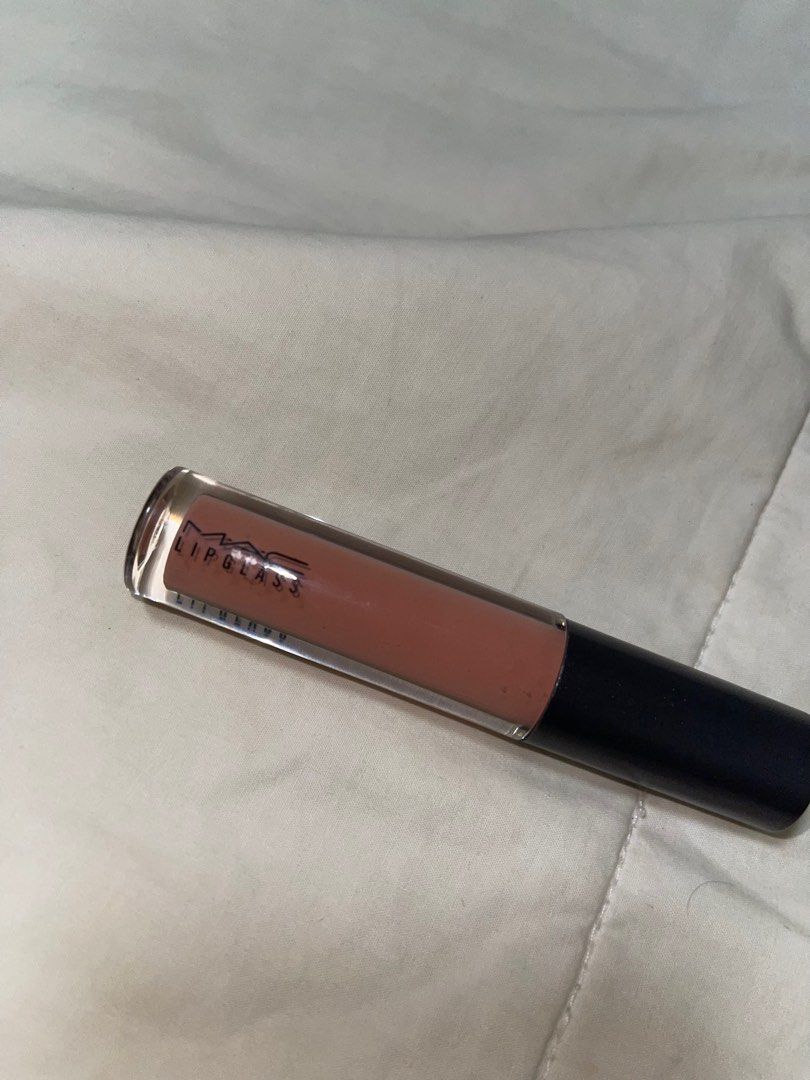 MAC LipGlass Lust Authentic (Category: Makeup) located in Cainta. Submitted by d3clutterw0rld (Listing ID 1258866850, Image 2). Description: MAC LipGlass in the shade LUST. - bought from SEPHORA US. - used once. no issues. - payment first, gcash only. Message me for more information. .