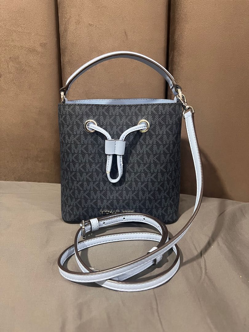 Michael Kors Suri Small Bucket Crossbody Bag, Women's Fashion, Bags &  Wallets, Cross-body Bags on Carousell