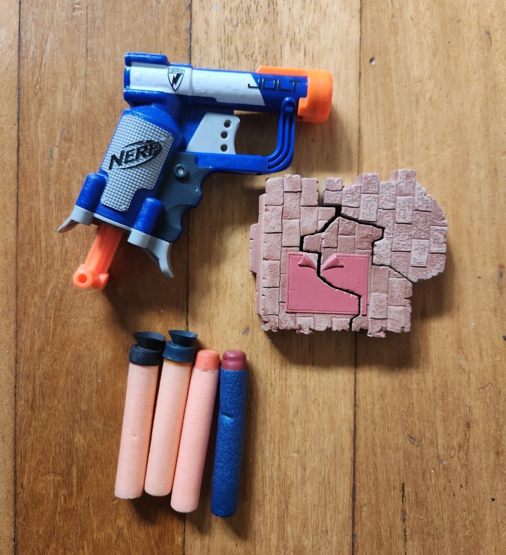 Nerf Elite Jolt (Category: Action & Battle Toys) located in Pasig City. Submitted by ge_borro (Listing ID 1258862722, Image 1). Description: Working, in good condition Comes with 4 bullets & Destructible Wall Target.