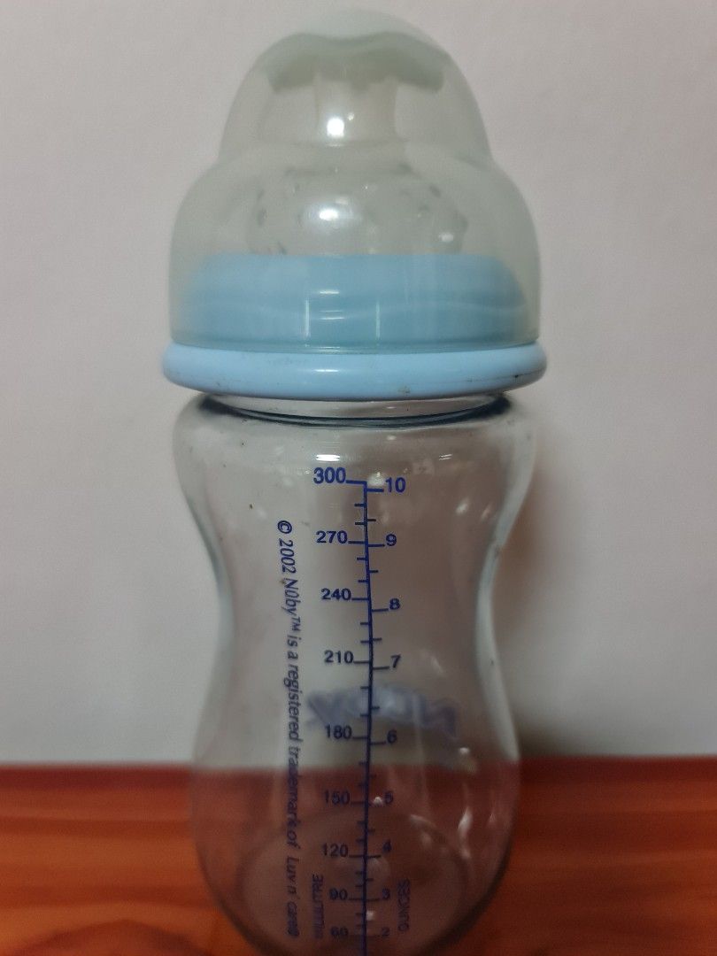 Nuby milk bottles top