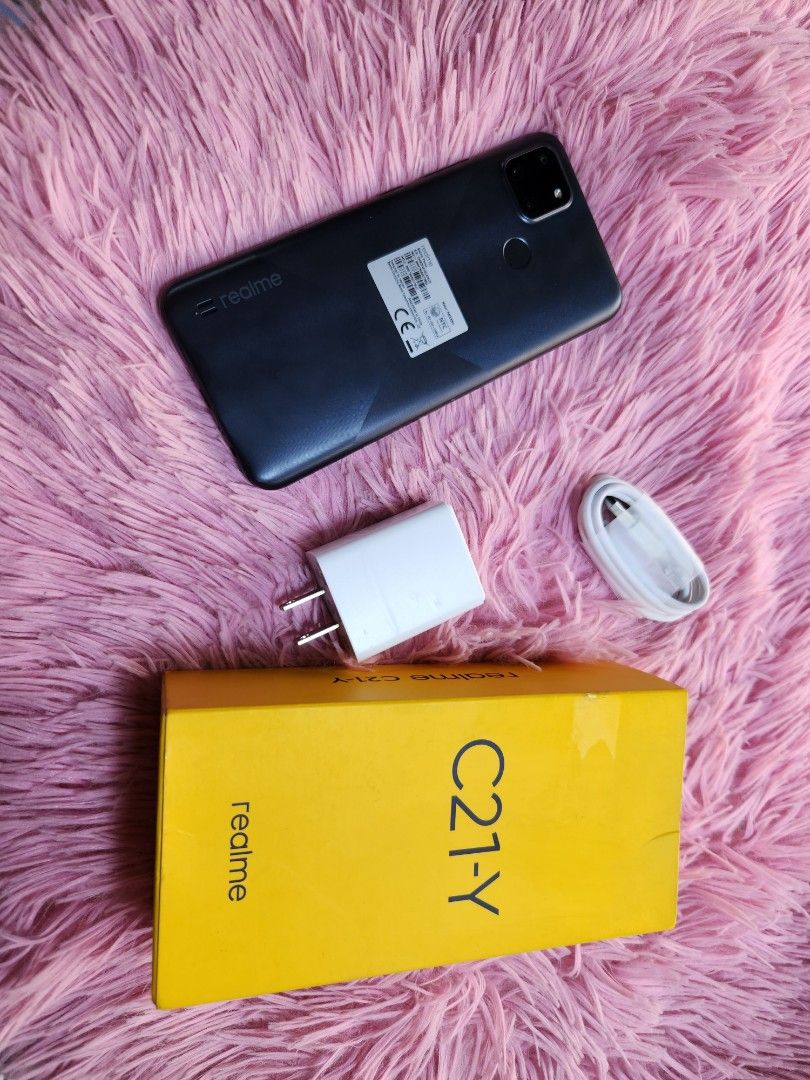 REALME C21y (Category: Realme) located in Quezon City. Submitted by mubrogadgets (Listing ID 1258728218, Image 2). Description: Realme c21-y brand new/Never pa nagamit binuksan lang para icheck 100% original(not clone) orig all packages mall full-out.