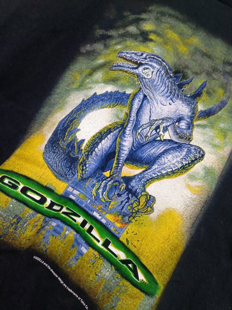 VINTAGE GODZILLA DATED 1998 (Category: Tshirts & Polo Shirts ) located in Quezon City. Submitted by veeejeeey (Listing ID 1258841782, Image 2). Description: VINTAGE GODZILLA DATED 1998 SIZE LARGE (22" x 29") Minor issue: Minimal bleached stain shoulder 2800 PESOS ONLY OPEN FOR MEET UP & SHIPPING AYALA MAKATI (Weekdays) SJDM BULACAN (Weekend) DM ME IF INTERESTED 📥.