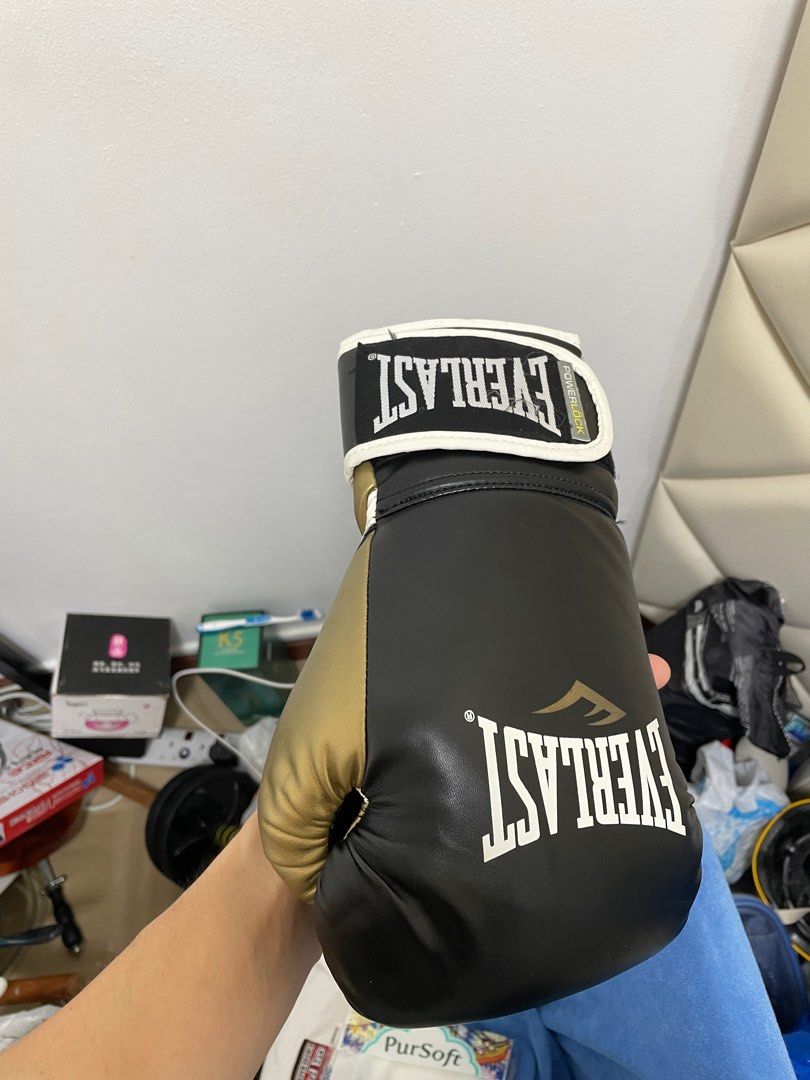 Two pairs of boxing gloves top