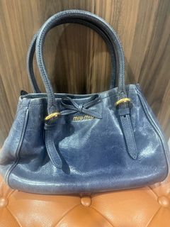 MIU MIU Sling Bag, Women's Fashion, Bags & Wallets, Shoulder Bags on  Carousell