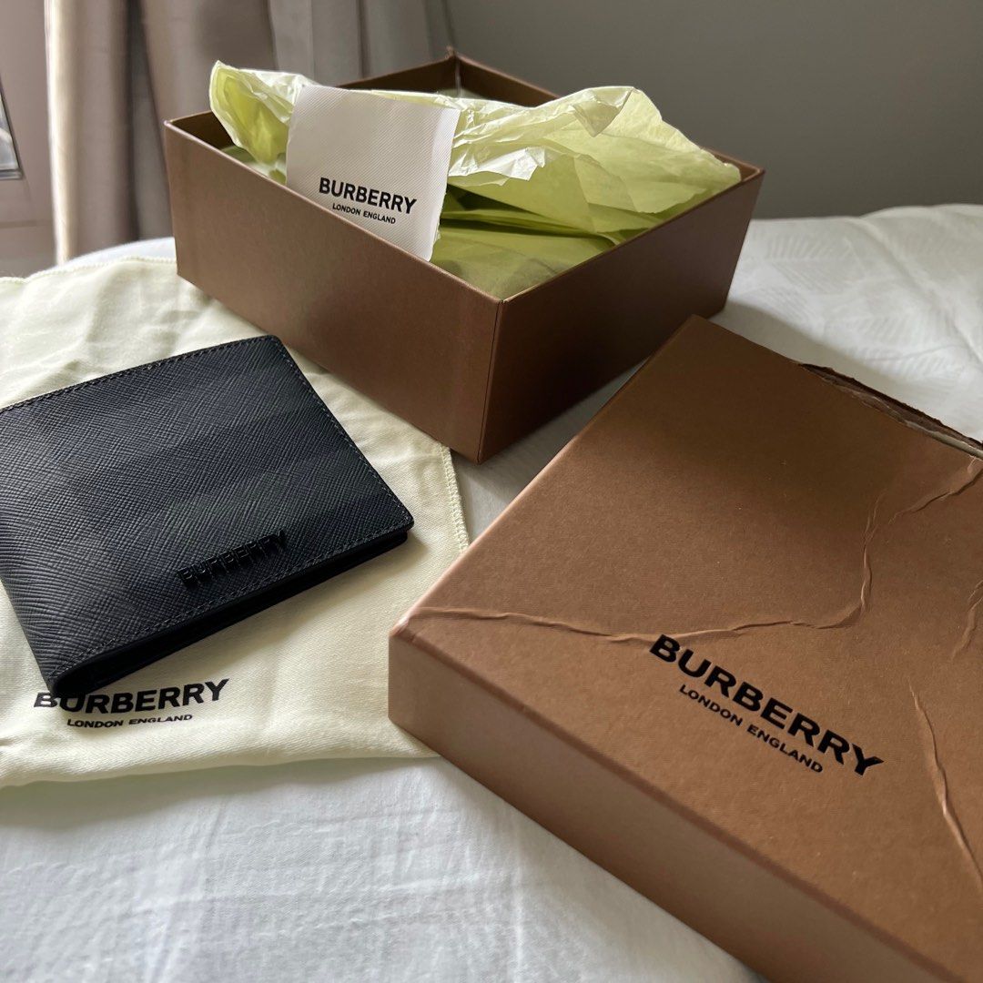 Burberry men check pattern International wallet. Brand new in box RRP 350 S 580 approx Genuine from London with original tags. Husband accidentally