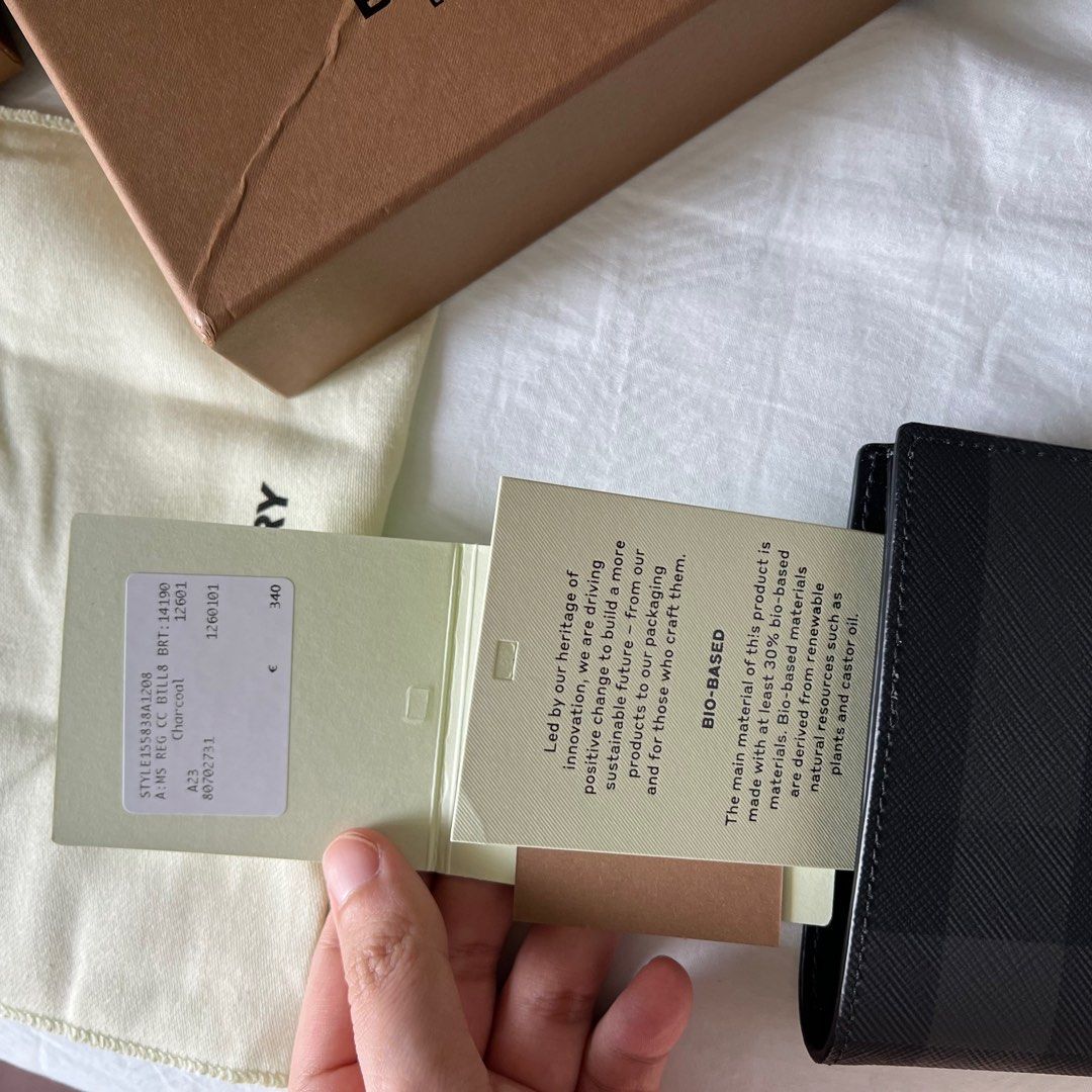 Burberry men check pattern International wallet. Brand new in box RRP 350 S 580 approx Genuine from London with original tags. Husband accidentally