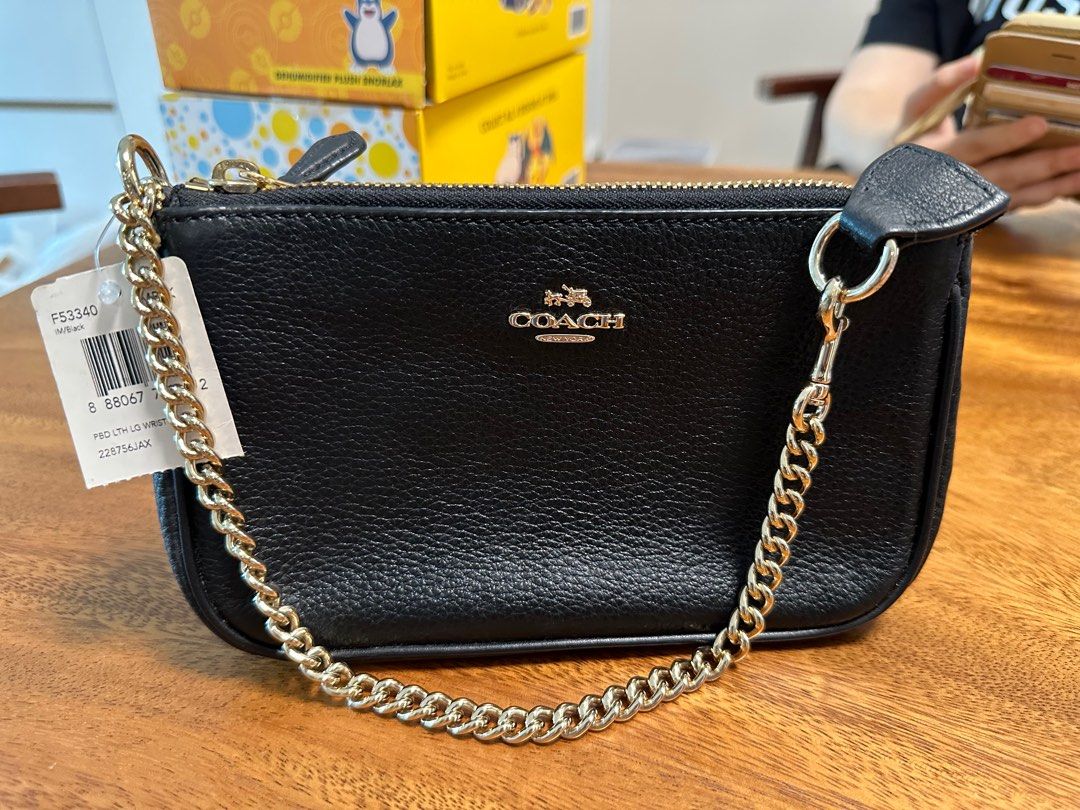 Gold deals wrist bag