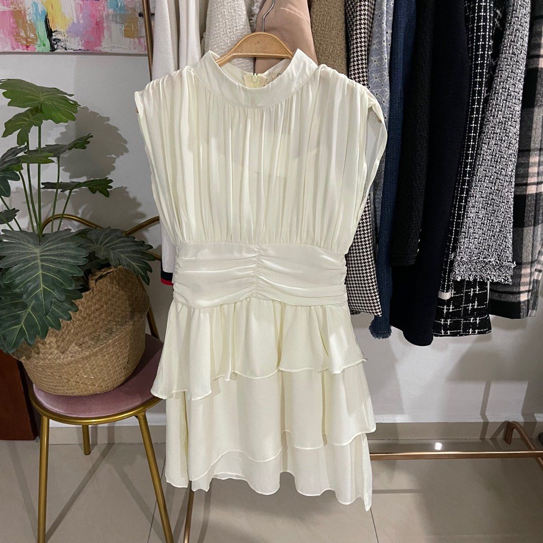 Ruffle Sleeveless Pleated Chiffon Top in Cream