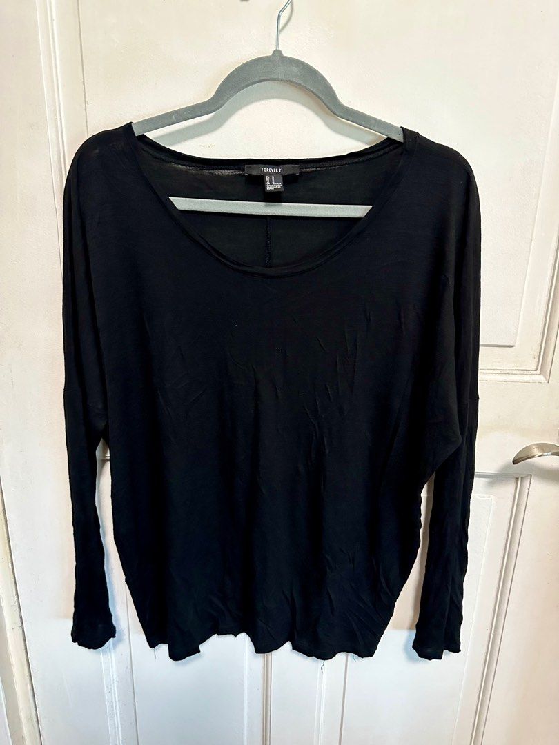 F21 Longsleeves Top (Category: Blouses) located in Manila. Submitted by mixandbits (Listing ID 1258978156, Image 1). Description: F21 Black Long sleeves Medium on tag fits Med to Large.