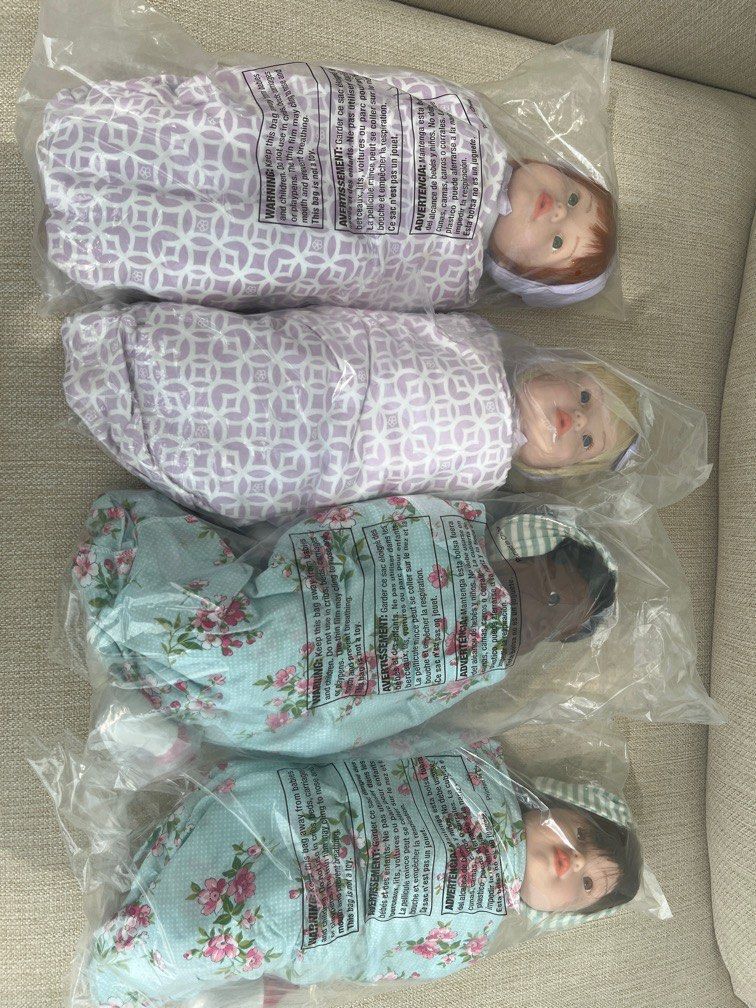 FAO Schwarz 14 inch Baby Doll with pacifier