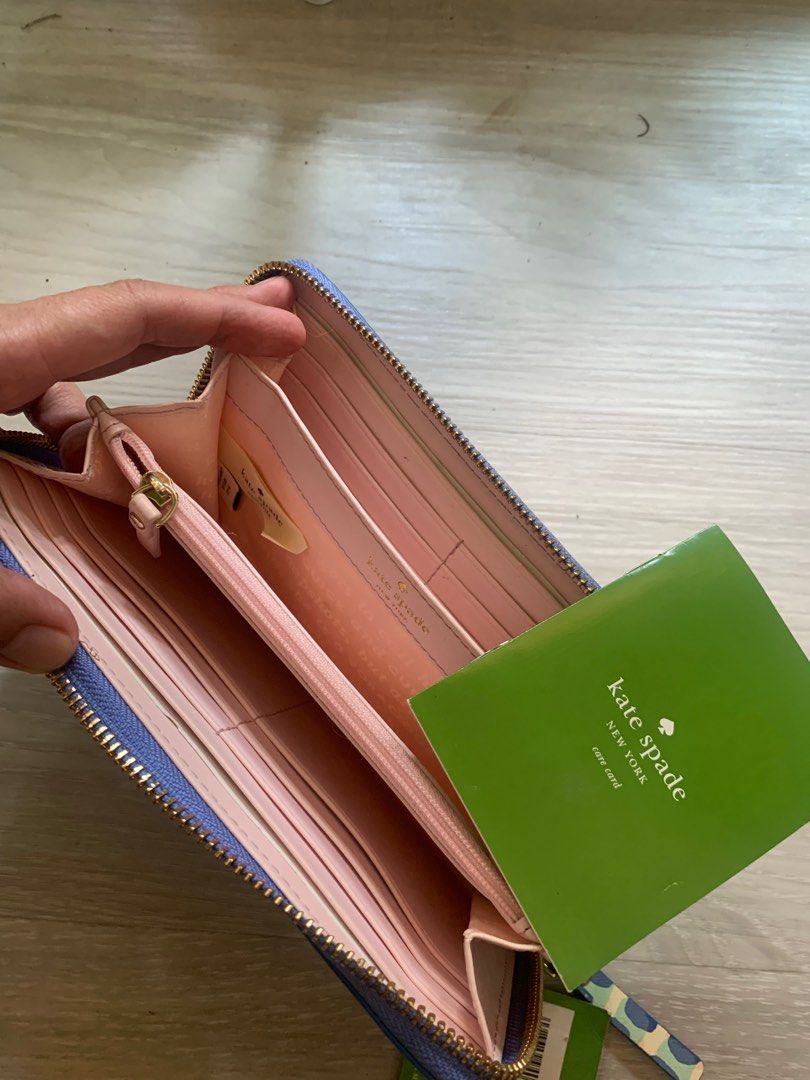 Inside of shop kate spade purse