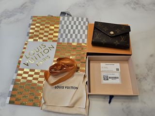 Authentic Louis Vuitton Victorine Wallet (Fuchsia Interior), Luxury, Bags &  Wallets on Carousell