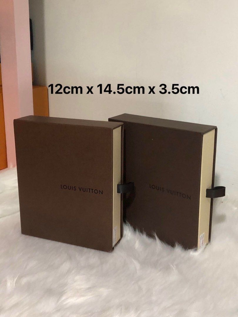 Original Louis Vuitton Small Wallet Box (Category: Luxury Bags & Wallets) located in Quezon City. Submitted by box.luxebycheng (Listing ID 1259050250, Image 2). Description: Original Louis Vuitton Small Wallet Box 📌 Php 600 each ‼️available in 2 sizes ✅ good condition ✅ BOX ONLY Please remember that you are about to purchase a preloved item. There might be some signs of usage/storage. Refer carefully to the photos provided. Ask for more photos i