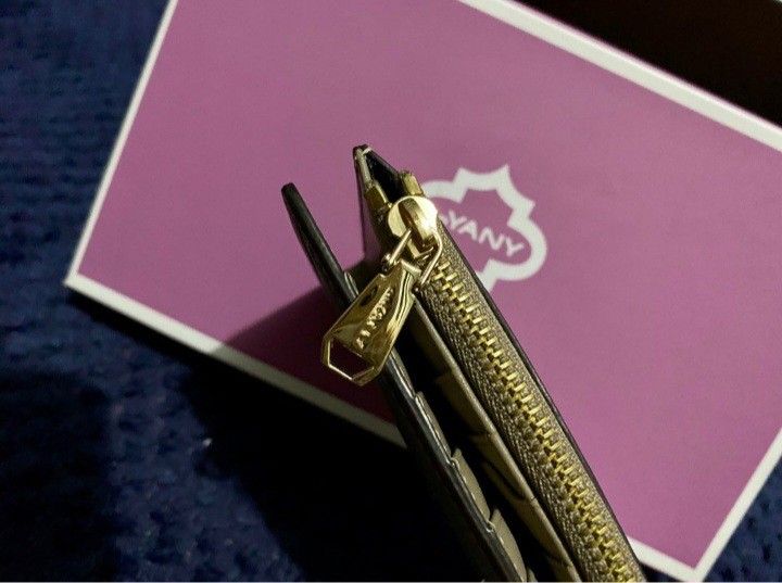 OrYany wallet (Category: Luxury Bags & Wallets) located in Lipa City. Submitted by myrich (Listing ID 1258921150, Image 3). Description: Brand new medium size with box and authenticity card has multiple card slots and picture slot color:beige.