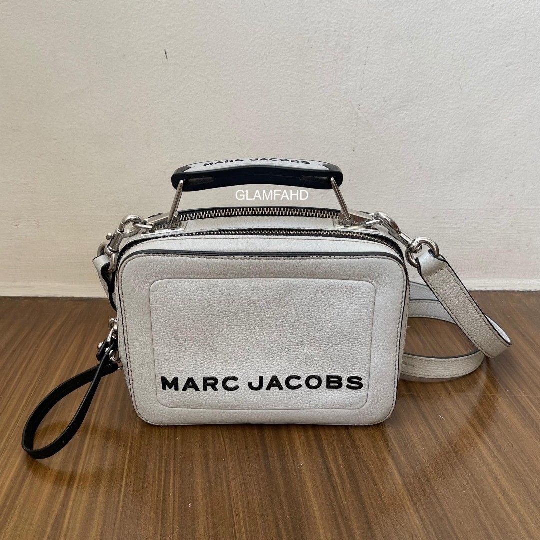 Pre Owned Authentic MARC JACOBS The Box Mini Leather Bag (Category: Luxury Bags & Wallets) located in Paranaque City. Submitted by Glamfahd (Listing ID 1259064227, Image 2). Description: PRE OWNED AUTHENTIC MARC JACOBS THE BOX MINI LEATHER BAG Features Leather Measurements: 7.5x5.5x3 Inches Zipper closure 2 compartments Interior zip pocket Inclusion/s: Removable strap Condition Good condition Signs of use Marks on exterior Abrasion on corners Dir