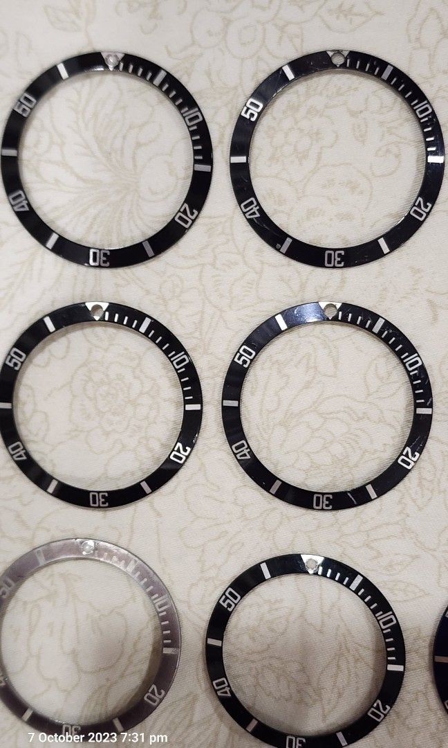 Rolex bezel inserts (Category: Watches) located in Singapore. Submitted by teojjsg (Listing ID 1258905252, Image 2). Description: All genuine Rolex bezel inserts. Some with missing pearls, some intact. Prefer to sell as a lot. For individual pcs, circle out the pc you want with an offer price. Will not respond to those without price offers. Thank you for looking guys..