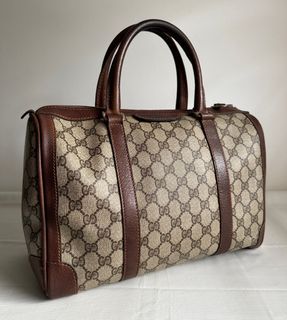 GUCCI BOSTON BAG, with iconic GG print coated canvas with patent