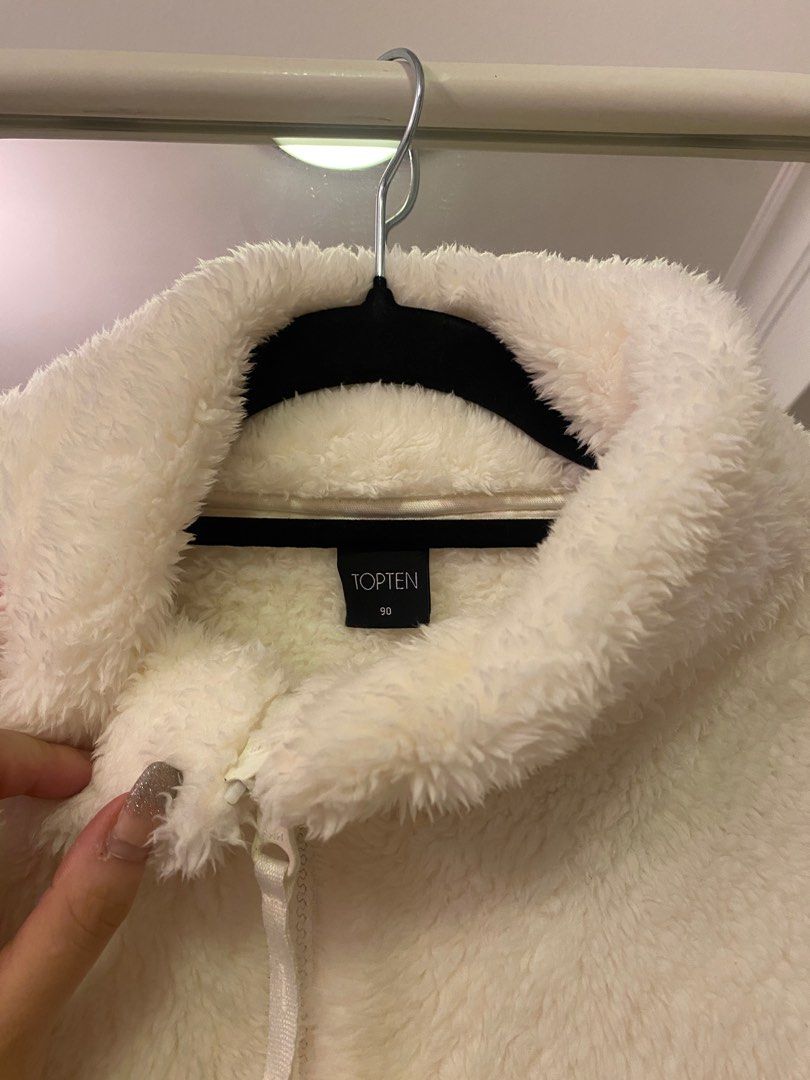 White teddy bear store jacket