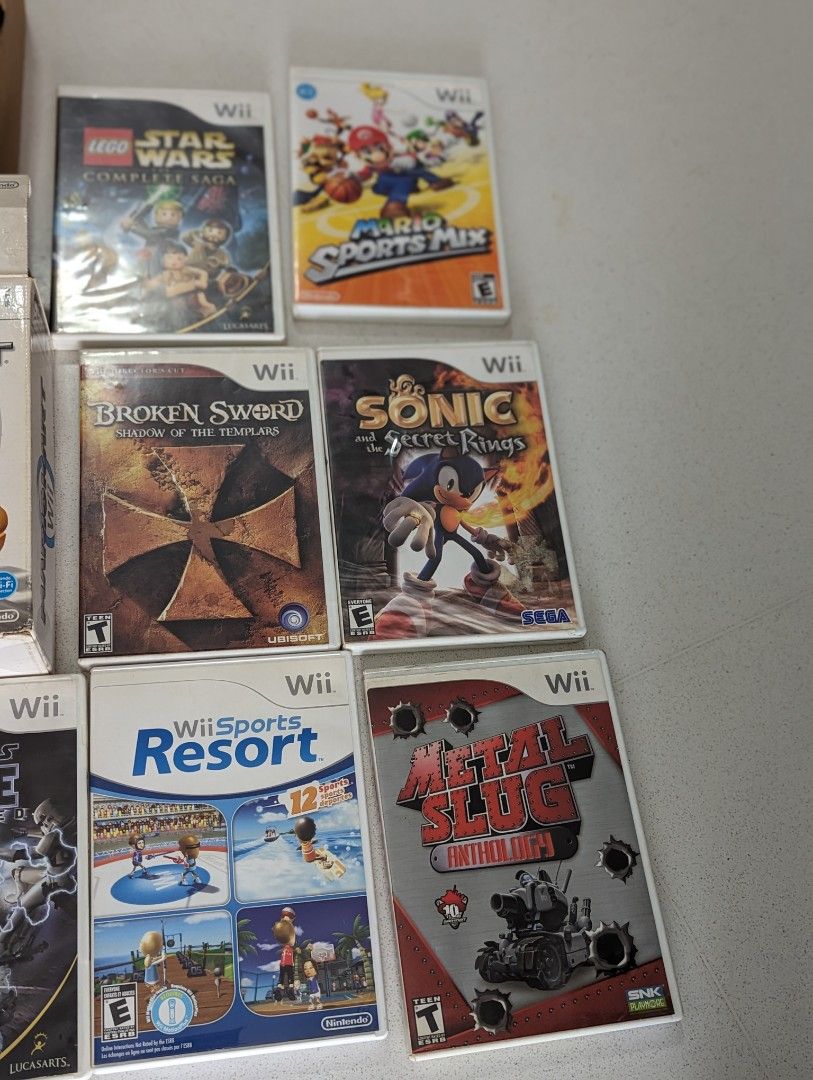 Wii Games Nintendo Mario kart Wii sports resort metal slug anthology sonic  secret rings broken sword Lego star wars complete saga Mario sports mix  spiderman 3 star wars forces unleashed steering wheel,