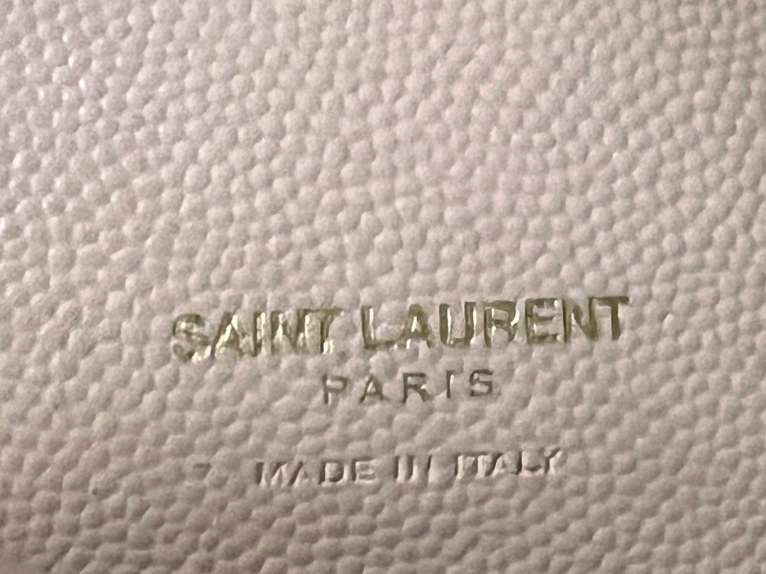 YSL Wallet (Category: Luxury Bags & Wallets) located in Paranaque City. Submitted by katlopez0214 (Listing ID 1258893567, Image 3). Description: YSL small wallet in nude beige color With signs of wear Still in good condition No box 100% authentic Rfs: decluttering.