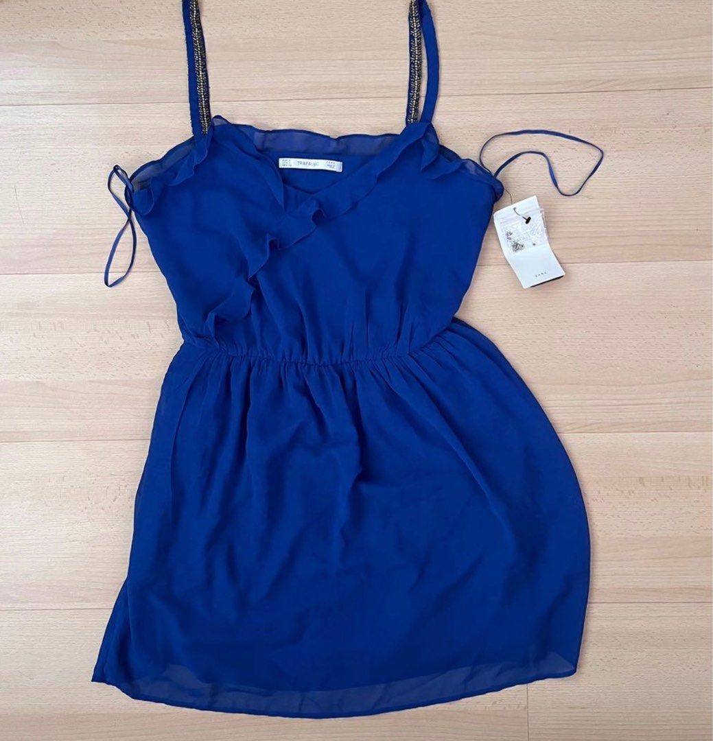 Zara Mini Dress (Category: Dresses) located in Makati City. Submitted by bilzer (Listing ID 1259005711, Image 1). Description: Blue mini dress With extra beads Unworn, brand new Negotiable ◡̈ .