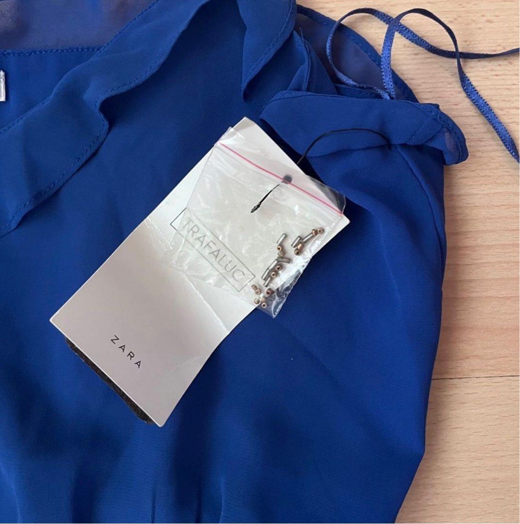 Zara Mini Dress (Category: Dresses) located in Makati City. Submitted by bilzer (Listing ID 1259005711, Image 3). Description: Blue mini dress With extra beads Unworn, brand new Negotiable ◡̈ .