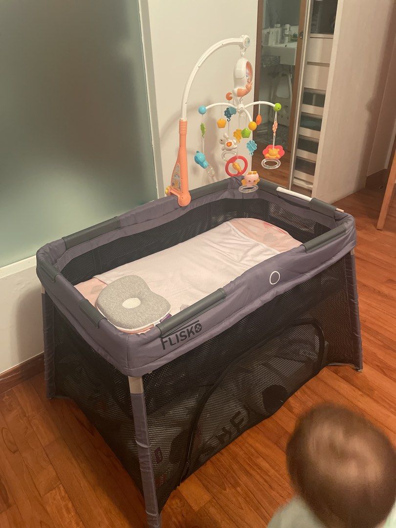 Flisko online travel crib