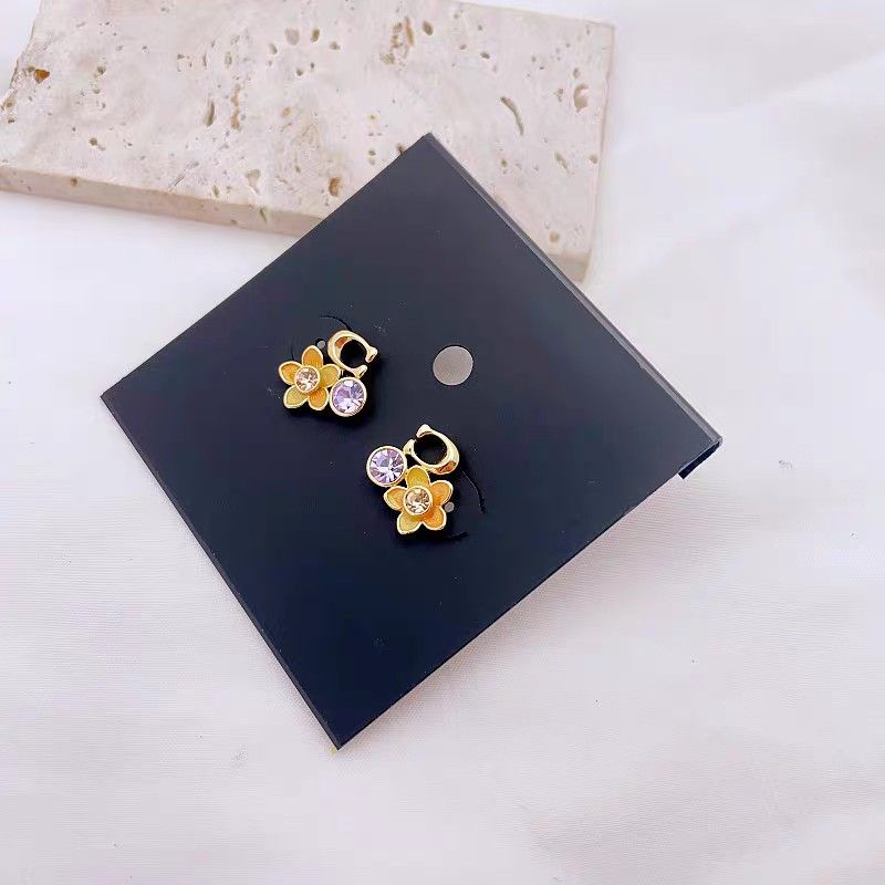 Coach flower shop earrings