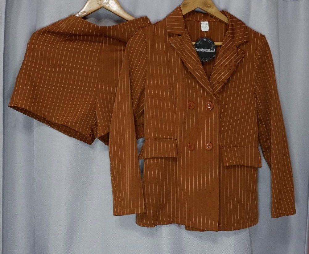 Brandnew Blazer and Shorts Coordinates (rust) (Category: Sets or Coordinates) located in Cainta. Submitted by vestito_bestida (Listing ID 1259137345, Image 3). Description: ⛔️ACTUAL PHOTO POSTED⛔️ 👉 Brandnew 👉 BKK Blazer and Shorts Coordinates 👉 Color: rust 👉 Size: small to semi large 👉 Waist: 24" to 30" 👉 Length: 15" 👉 Blazer's Length: 24.5" 👉 Shorts with zipper on the side 👉 Flatlay measured using medida 👉 Actual photo posted. 👉 No f