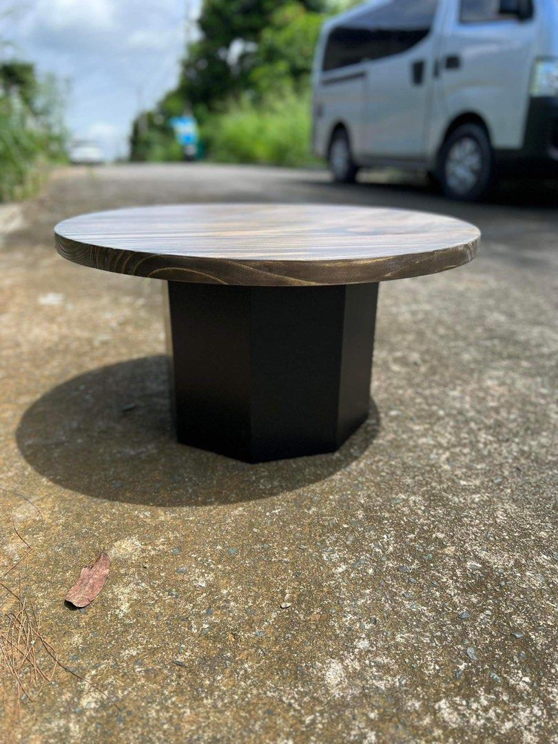Customize design solid wood center table in walnut finish (Category: Tables & Sets) located in Paranaque City. Submitted by FLess.ph (Listing ID 1259090488, Image 1). Description: 28x28 inches diameter center table 1-5 inches base wood top thickness Walnut finish We customise in any size, design and finish.