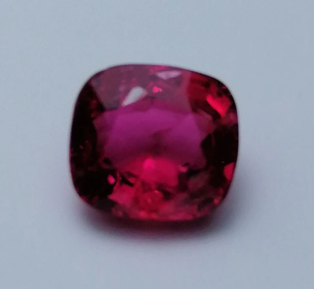 Reddish purple sale gemstone