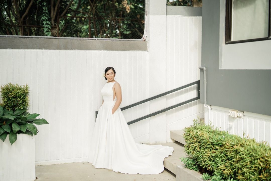 M-L minimalist wedding gown (Category: Evening dresses & gowns) located in Mandaluyong City. Submitted by preloveddestash (Listing ID 1259170904, Image 3). Description: Wedding dress designer/ made by Riad Hans Material: French Mikado (matte) Selling price: 20k Original price: 25k minimalist wedding dress design boat neckline built-in pads, lined open back with straps with pockets on both sides zipper on the lower back part of the dress 2 feet tr