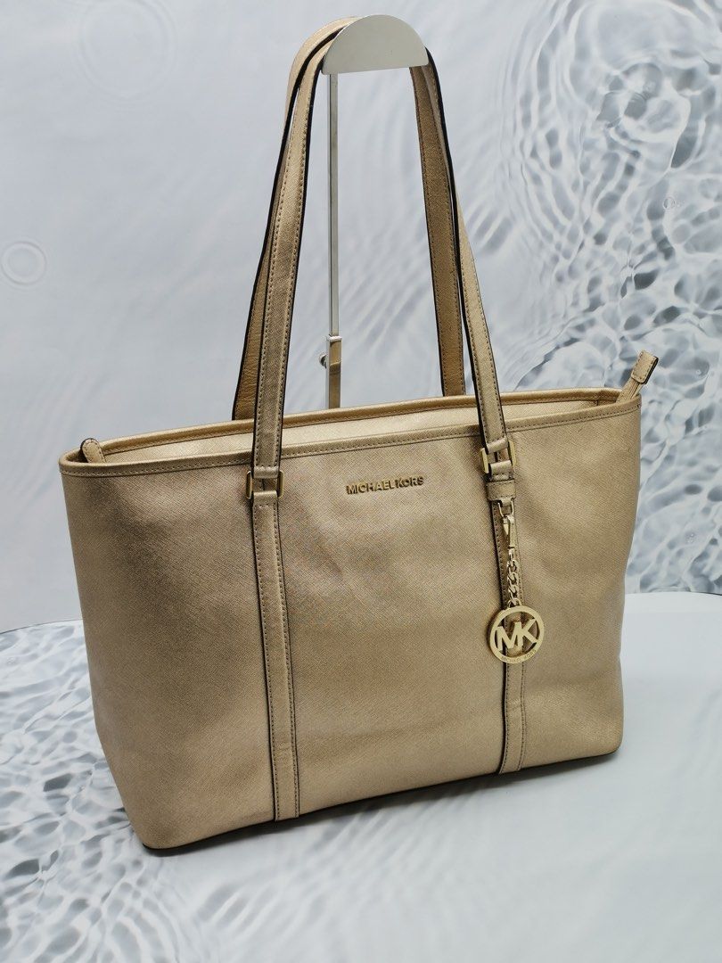 Metallic gold michael best sale kors purse