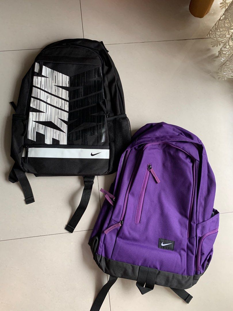 Purple and black nike backpack deals